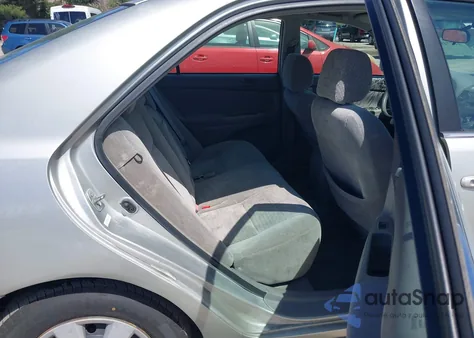 2002 Toyota Camry Le from USA, damaged, VIN 4T1BE32K32U029669